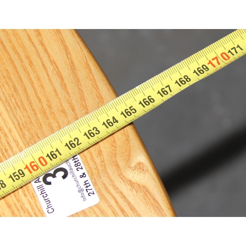 21A - A vintage blonde Ercol extending dining table