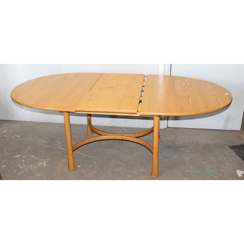 21A - A vintage blonde Ercol extending dining table