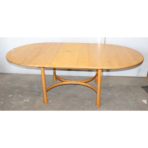 21A - A vintage blonde Ercol extending dining table