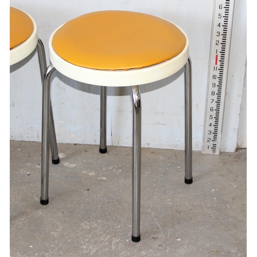 1 - A set of 6 retro stacking stools by Chair Centre, dated January 1972, with mustard coloured seats, c... 