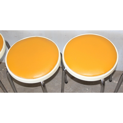 1 - A set of 6 retro stacking stools by Chair Centre, dated January 1972, with mustard coloured seats, c... 
