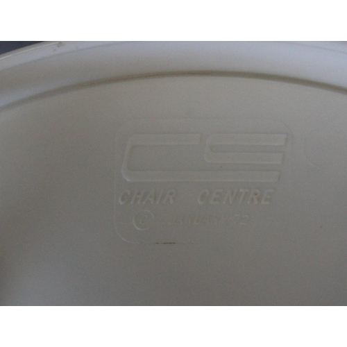 1 - A set of 6 retro stacking stools by Chair Centre, dated January 1972, with mustard coloured seats, c... 