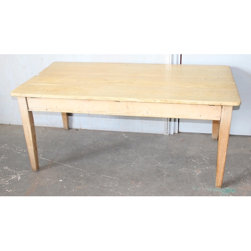 10 - A large antique pine country farmhouse kitchen table with drawer, approx 170cm x 87cm
