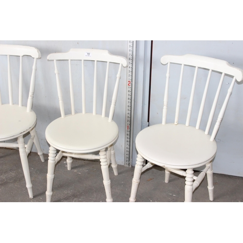 15 - A matched set of 4 antique spindle back penny seat chairs, painted white