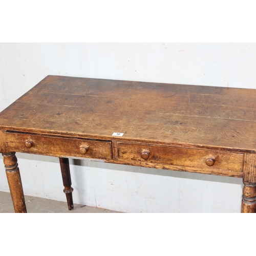 16 - An antique oak 2 drawer hall or side table, approx 107cm wide