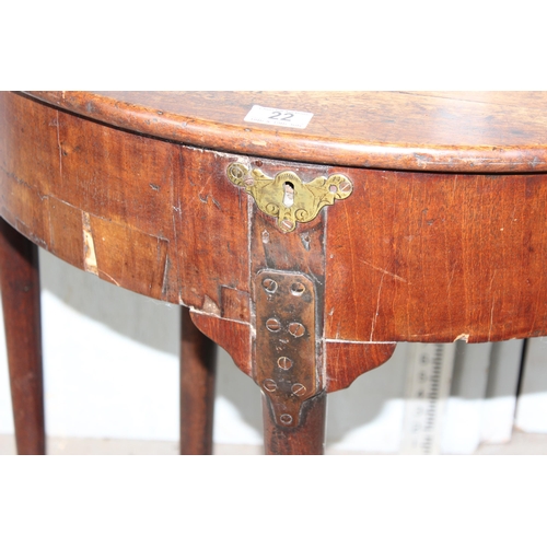 22 - An unusual Georgian mahogany demi-lune drop leaf tea or console table with locking compartment, stan... 