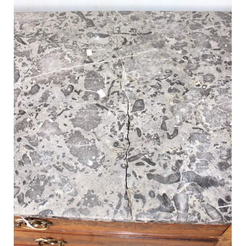 24 - An antique 4 drawer mahogany chest of drawers with grey marble top. likely French