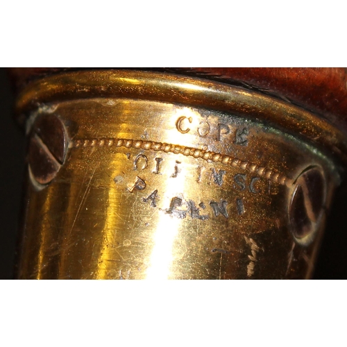 29 - An antique low chair with later floral upholstery, brass and ceramic castors stamped Cope Collinson ... 