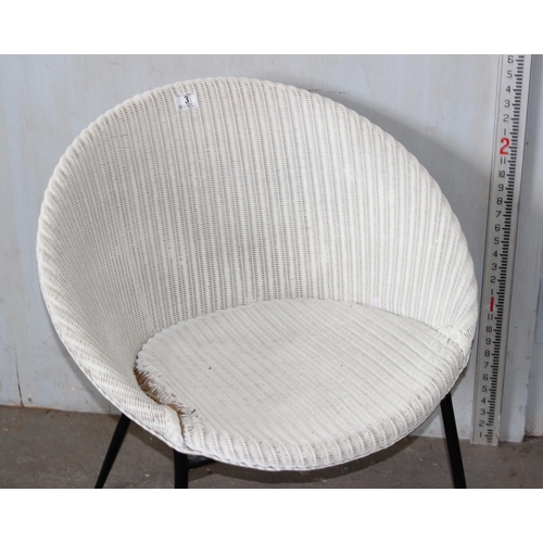 3 - An unusual white painted Lloyd Loom chair, egg or satellite shape, with label