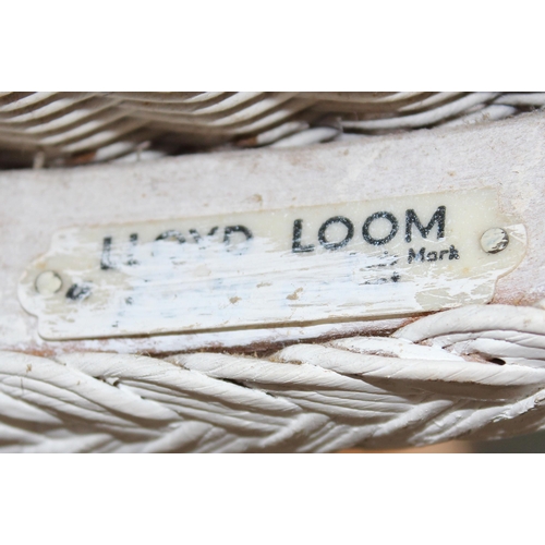 3 - An unusual white painted Lloyd Loom chair, egg or satellite shape, with label