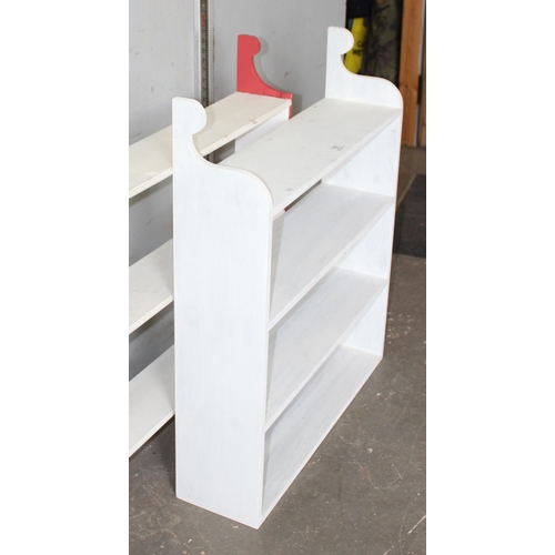 31 - 2 painted wall mounted bookshelves