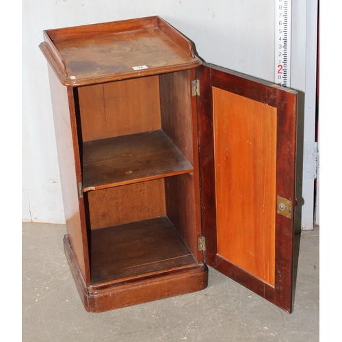34 - An antique mahogany bedside cabinet