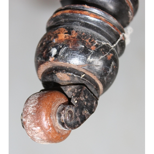 36 - A Victorian ebonised table in the manner of Liberty & Co with splayed legs, stamped number to base