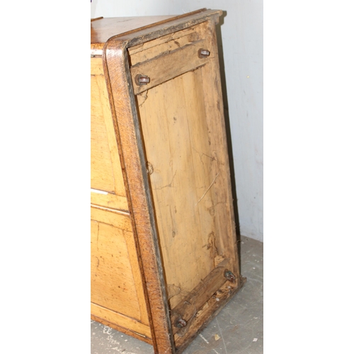 37 - A small vintage oak cupboard with one long drawer, approx 107cm wide