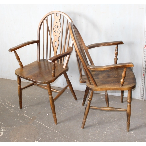 50 - A pair of vintage wheel backed farmhouse carver chairs