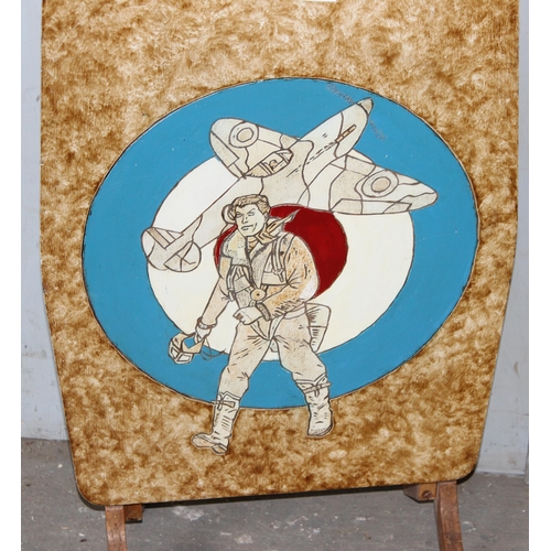 6 - An unusual vintage folding table or fire screen with painted and carved details of RAF roundel, pilo... 