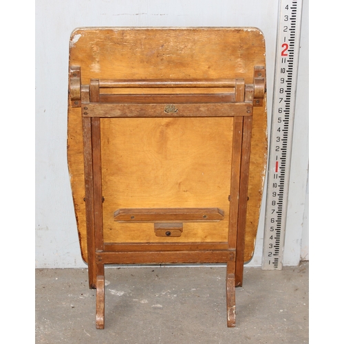 6 - An unusual vintage folding table or fire screen with painted and carved details of RAF roundel, pilo... 