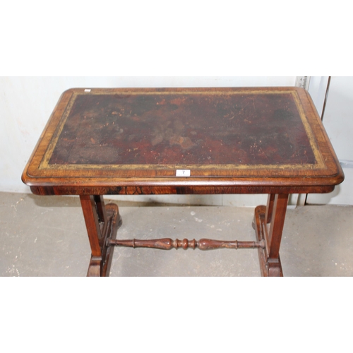7 - A 19th century rosewood library table table with gilt tooled leather insert, the base with turned st... 