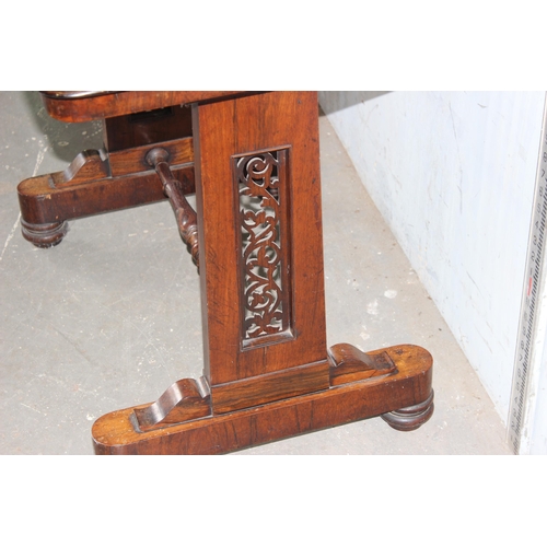 7 - A 19th century rosewood library table table with gilt tooled leather insert, the base with turned st... 