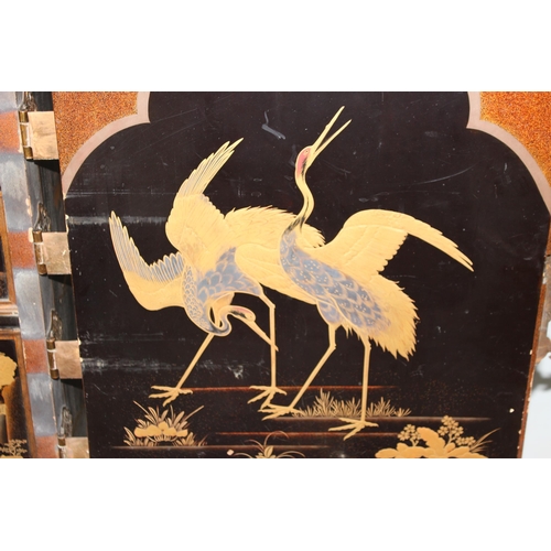 8 - An antique Japanese lacquered cabinet on stand with brass fittings and original key, likely c.1800 o... 