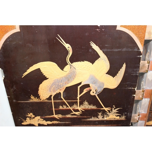 8 - An antique Japanese lacquered cabinet on stand with brass fittings and original key, likely c.1800 o... 