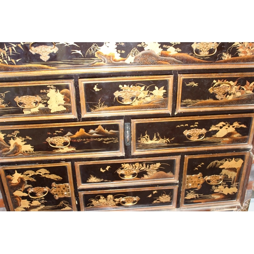 8 - An antique Japanese lacquered cabinet on stand with brass fittings and original key, likely c.1800 o... 
