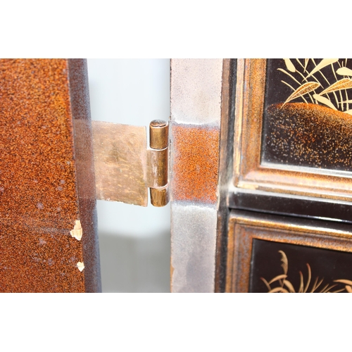 8 - An antique Japanese lacquered cabinet on stand with brass fittings and original key, likely c.1800 o... 