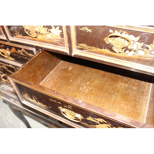8 - An antique Japanese lacquered cabinet on stand with brass fittings and original key, likely c.1800 o... 