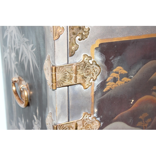 8 - An antique Japanese lacquered cabinet on stand with brass fittings and original key, likely c.1800 o... 
