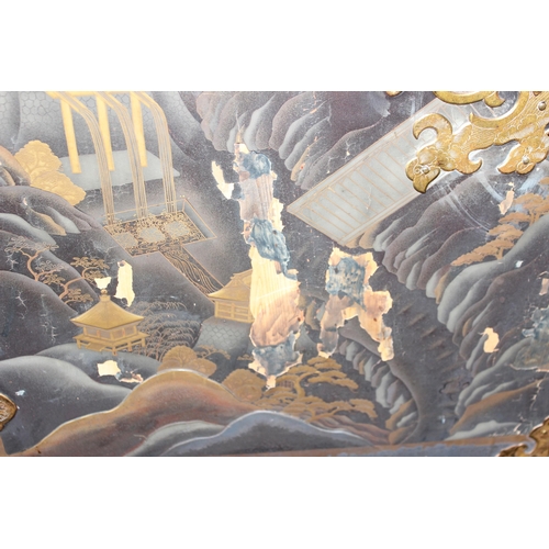 8 - An antique Japanese lacquered cabinet on stand with brass fittings and original key, likely c.1800 o... 