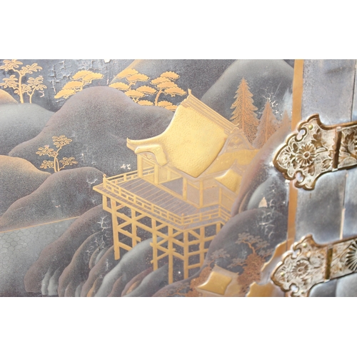 8 - An antique Japanese lacquered cabinet on stand with brass fittings and original key, likely c.1800 o... 