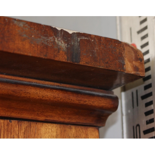 9 - An antique satinwood linen press type cupboard standing on over 2/3 drawers