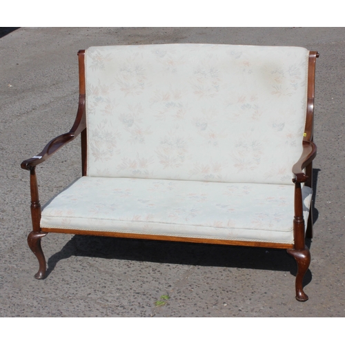 128 - A vintage wooden framed 2 seater small sofa or love seat with scroll arms