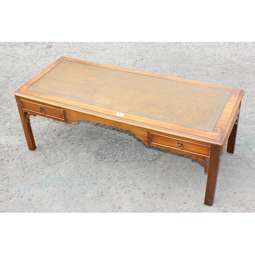 97A - Low leather topped coffee table with drawers