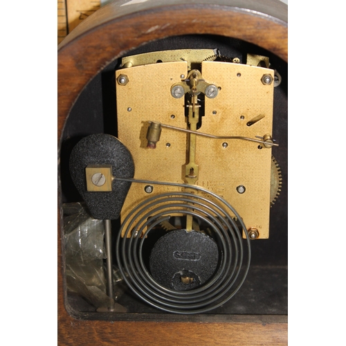 1411A - 2 vintage wooden cased mantel clocks, both with pendulums, one with key