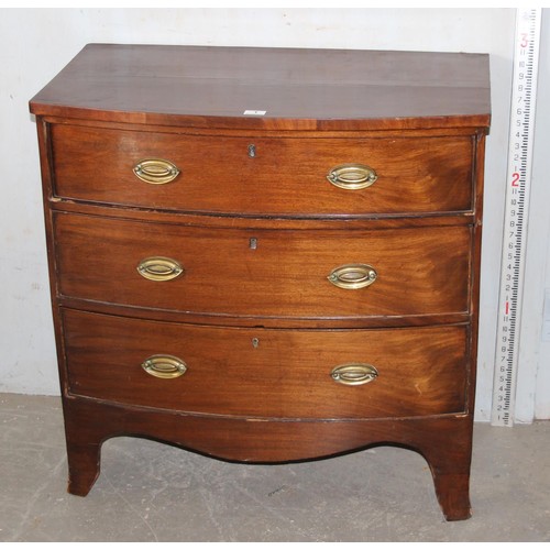 1 - A Regency mahogany bowfront chest of three long drawers on bracket feet, approx 86cm wide