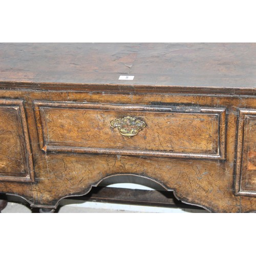 5 - A late 17th or early 18th century walnut sideboard (missing dresser on top), with three drawers appr... 