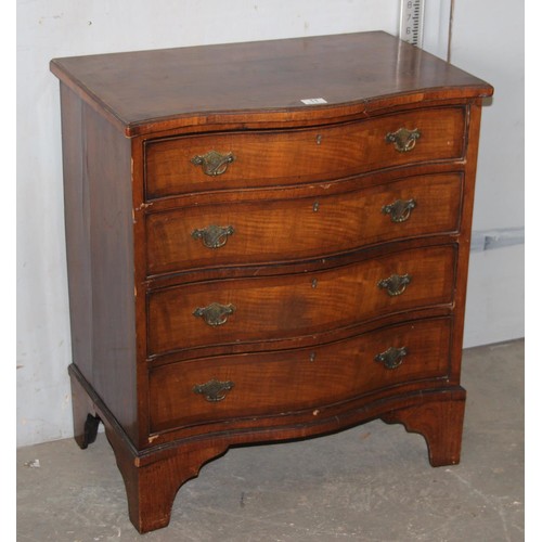 11 - An antique mahogany serpentine chest, crossbanded, with four long drawers 2’2 1/2” wide