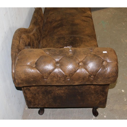 20 - A 20th century Chesterfield button backed leather or leatherette covered chaise longue