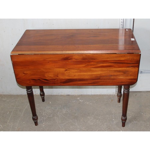 31 - An antique style drop leaf Pembroke table