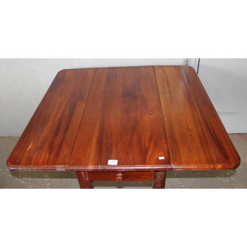 31 - An antique style drop leaf Pembroke table