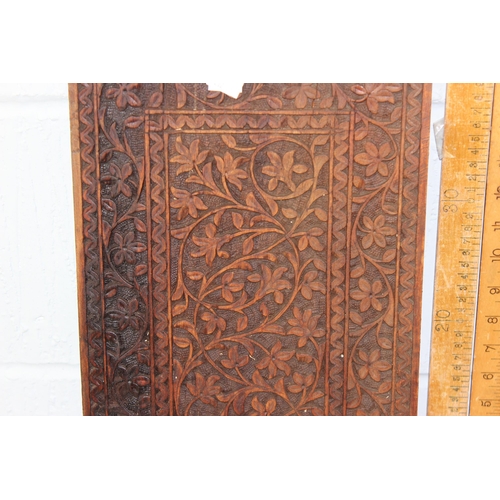 272 - An Indian carved wooden panel by Abdul Cafoor and 2 Indian carved hardwood extending book slides (3)