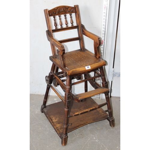 40 - A vintage wooden metamorphic child's high chair and walker, early 20th century