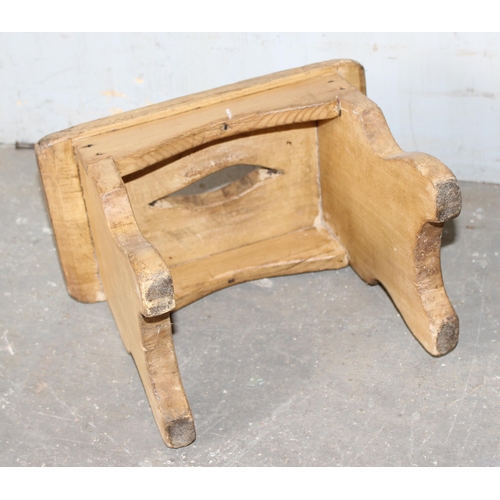 44 - A small antique pine and elm milking stool