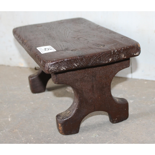 45 - A small antique elm milking stool