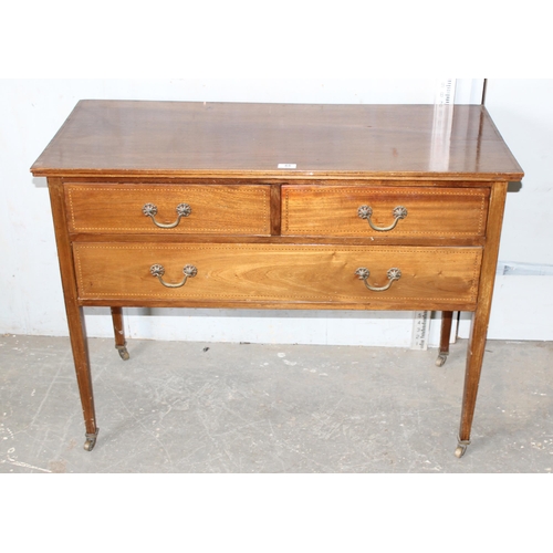 48 - An Edwardian Sheraton revival 2 over 3 dressing table base