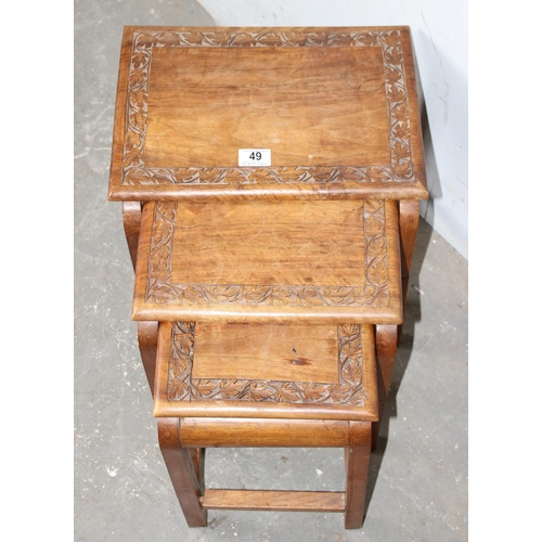 49 - A vintage Indian carved nest of 3 tables