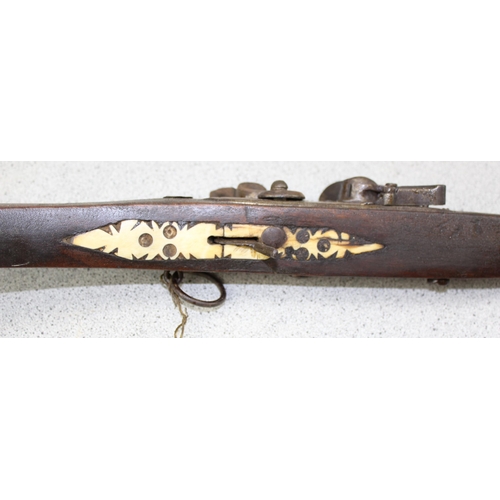 1001 - A 19th century North African flintlock musket known as a Moukahla or a Kabyle musket, possibly Moroc... 