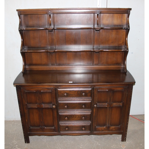 19 - A vintage Ercol dresser, with dark finish