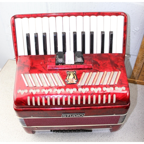 652 - Vintage Parrot Studio accordion in hard case